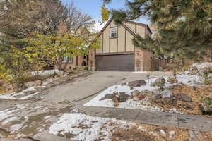 View of front of home featuring a garage