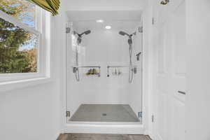 Bathroom featuring walk in shower