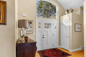 Entryway with light wood-type flooring