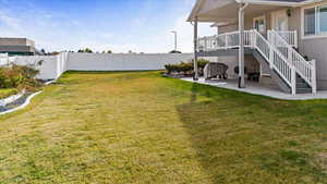 View of yard with a patio area