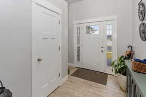 Entryway featuring light hardwood / wood-style flooring