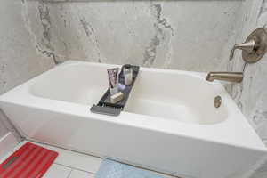 Bathroom featuring tile patterned flooring