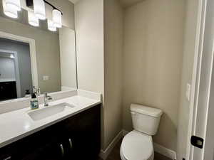 Bathroom with vanity and toilet