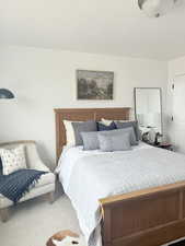 Bedroom with a textured ceiling