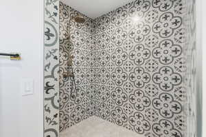 Bathroom with a tile shower