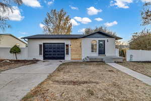 Single story home with a garage