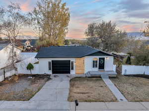 View of front of home with a garage