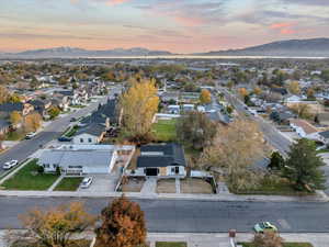 Aerial view at dusk featuring a mountain view