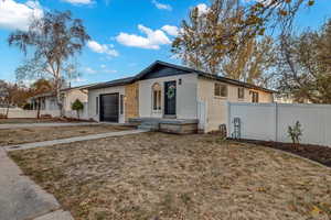 View of front of property featuring a garage