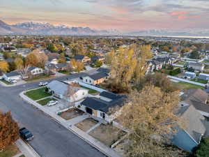 Aerial view at dusk featuring a mountain view