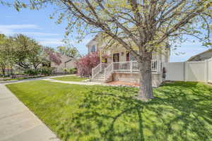 View of front of house with a front lawn