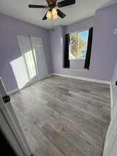 Spare room featuring light hardwood / wood-style flooring and ceiling fan