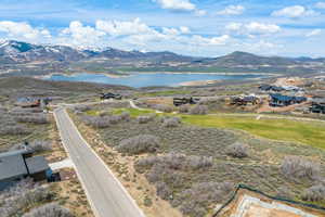 Property view of mountains featuring a water view