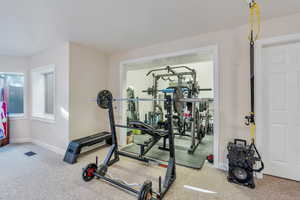 Exercise room with carpet floors