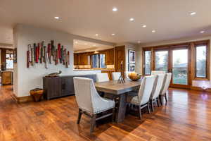 Dining space featuring french doors and dark hardwood / wood-style flooring