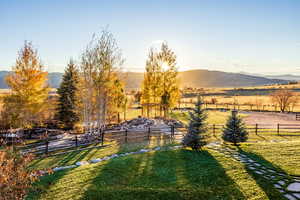 View of yard featuring a mountain view and a rural view