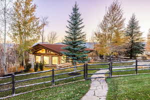 View of front of house featuring a lawn