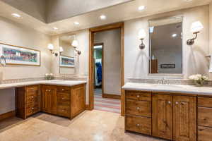 Bathroom with vanity and tile patterned floors