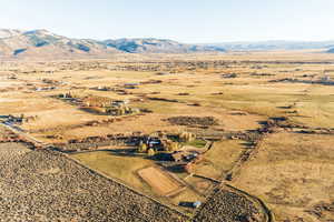 Drone / aerial view featuring a mountain view and a rural view