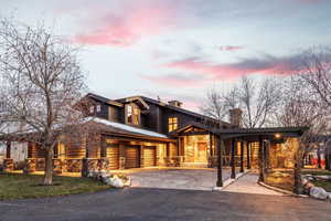 Cabin featuring a garage