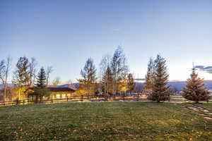 View of yard with a mountain view and a rural view