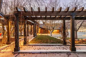 View of yard featuring a pergola