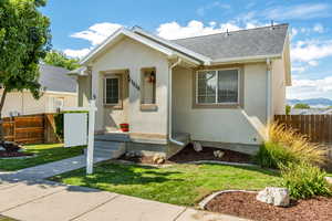 View of front of home featuring a front lawn