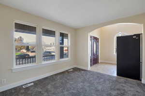 View of carpeted spare room