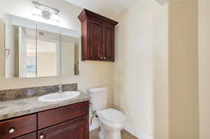 Bathroom with vanity and toilet