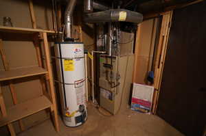 Utility room with heating unit and water heater