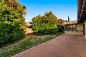 View of yard with a patio area