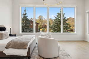 View Out of Floor To Ceiling Windows in Primary Bedroom