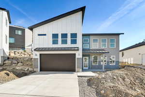 Modern home featuring a garage