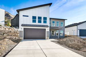 Modern home featuring a garage