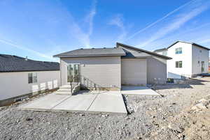 Back of property featuring a patio area