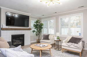 Spacious Living Room with Cozy Fireplace