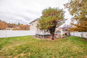 View of yard featuring a deck