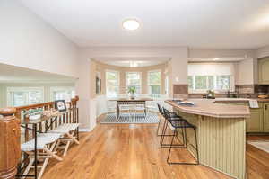 Spacious Kitchen & Dining Areas With Real Hardwood Flooring