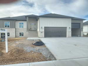 View of front of house with a garage