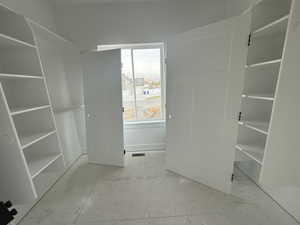 View of walk in closet