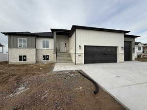 View of front facade with a garage