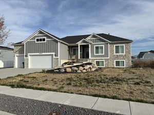 View of front of property with a garage