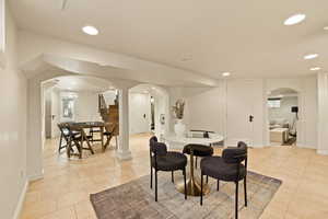 Dining room with light tile patterned floors