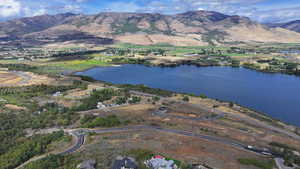 Bird's eye view featuring a water and mountain view