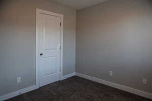 Bedroom featuring carpet flooring