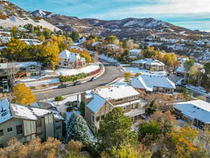 Birds eye view of property with a mountain view