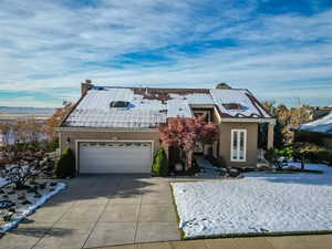 View of front of home featuring a garage