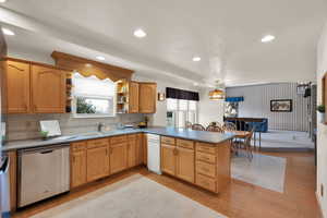 Kitchen with view into the dining room and living room.