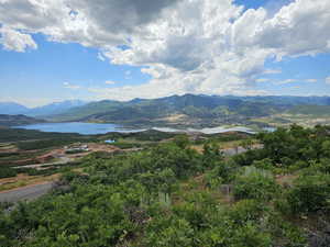 Mountain view featuring a water view