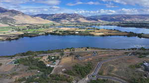 Bird's eye view with a water and mountain view